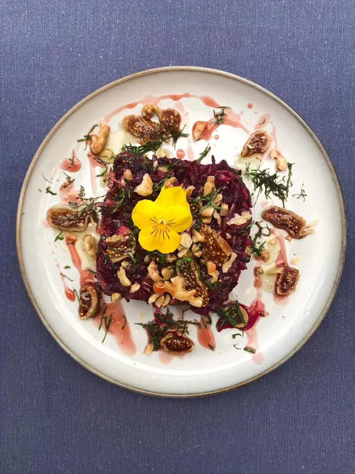Cherry beetroot with kaymak, walnuts and poppy seeds