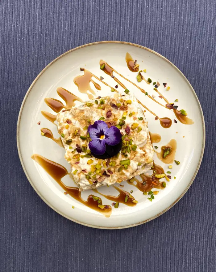 Girit ezme — whipped Turkish white cheese with pistachio and molasses